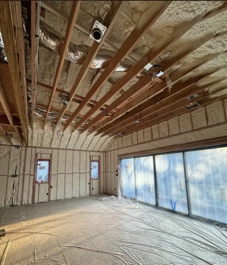 Interior walls and ceiling insulated with spray foam during new construction in Maple Valley